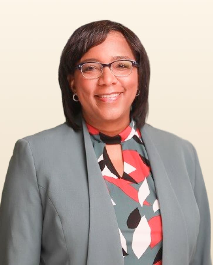 A professional portrait of Angelique Kelly-Lara