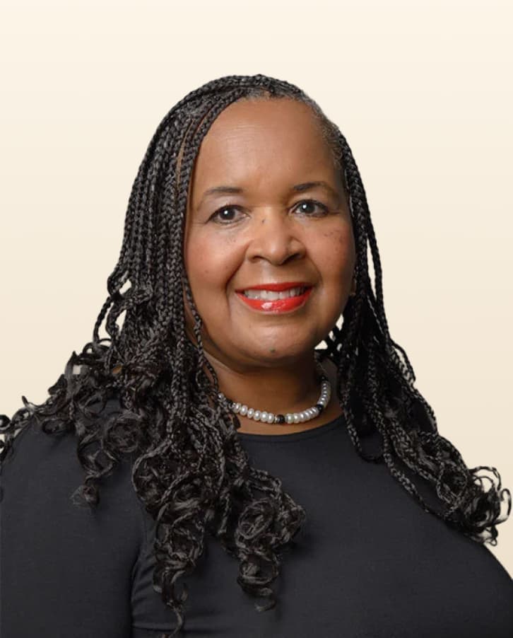A professional portrait of Rita Johnson Mills